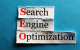 Scritta Search Engine Optimization su foglietti